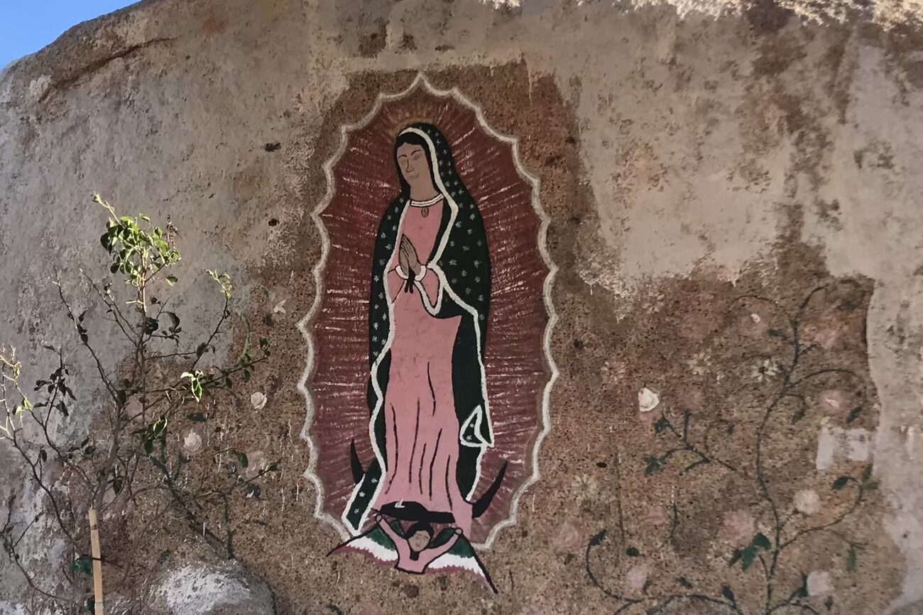 Rock art of the Virgin Mary at a roadside shrine