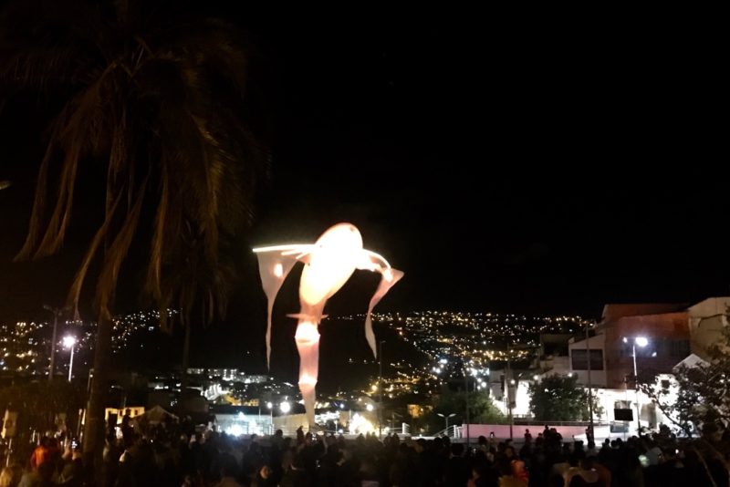A light performance of two of these surreal objects dancing above the crowd