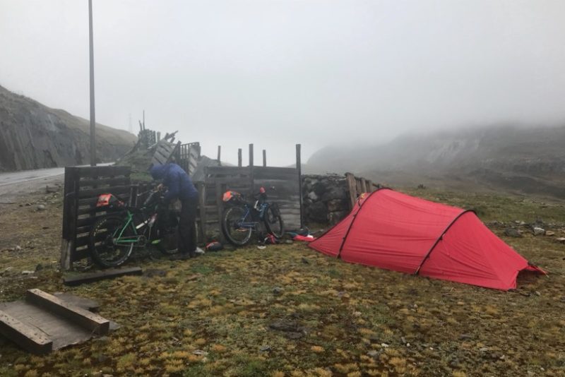 On our third day we left the tent after a lunchtime clearance which lasted till we were all packed up..we made a small dent in the next climb before pitching camp beside the road in the cold rain