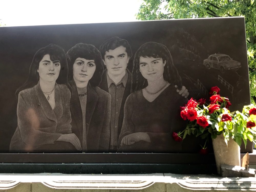 In the cemetery nearby the monastery the tombstones were engraved with likenesses of the persons passed away as is done throughout Georgia as well. This family appears to have perished in a car accident