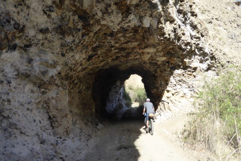 Big rocks held together by dirt form this tunnel, let’s hope there is not an earthquake