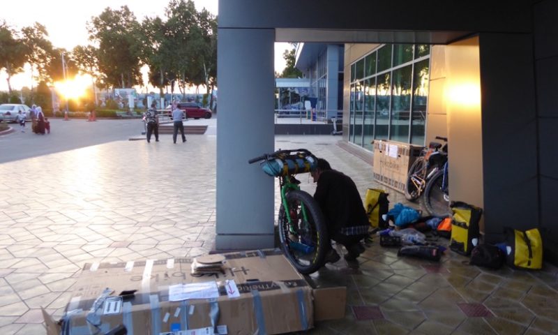 Reconstructing our bikes after early arrival at the airport in Dushanbe