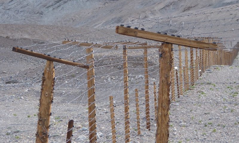 The Chinese ‘negotiated’ an extra 20km of land from Tajikistan and this barbed wire fence marks the line