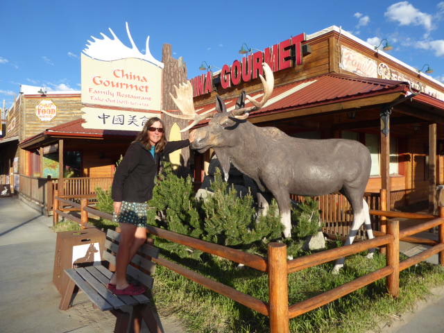 Patting the Pinedale Moose – note the cycle leg tan!